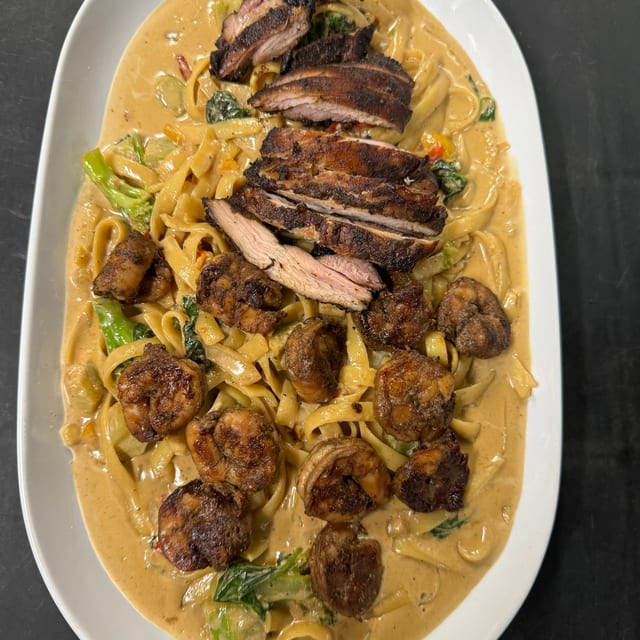 Jerk Chicken & Shrimp Alfredo Pasta.